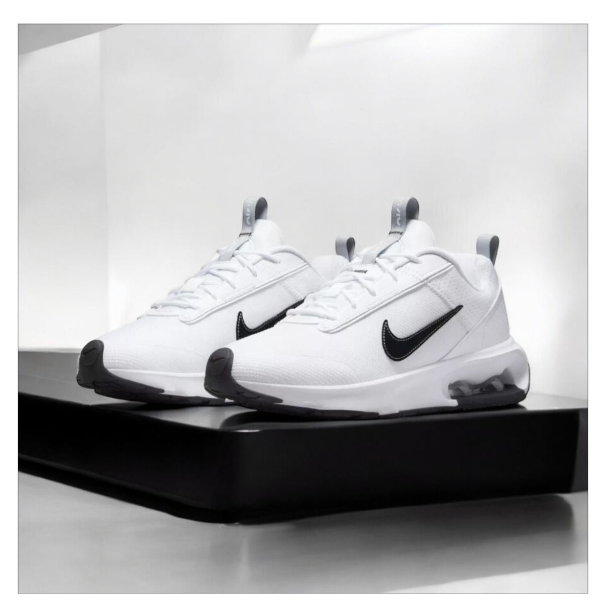 NIKE AIRMAX INTRLK ELITE sneakers showcase a stylish design with showroom quality, perfect for elevating your look.